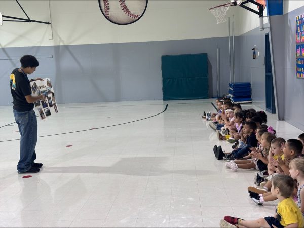 Joshua Martinez introducing himself to his PE class for PALs.